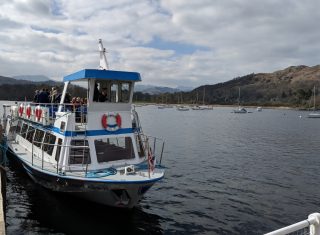 Lake Windermere, Lake District, Cumbria - Lake cruise with Langdale Pikes in background